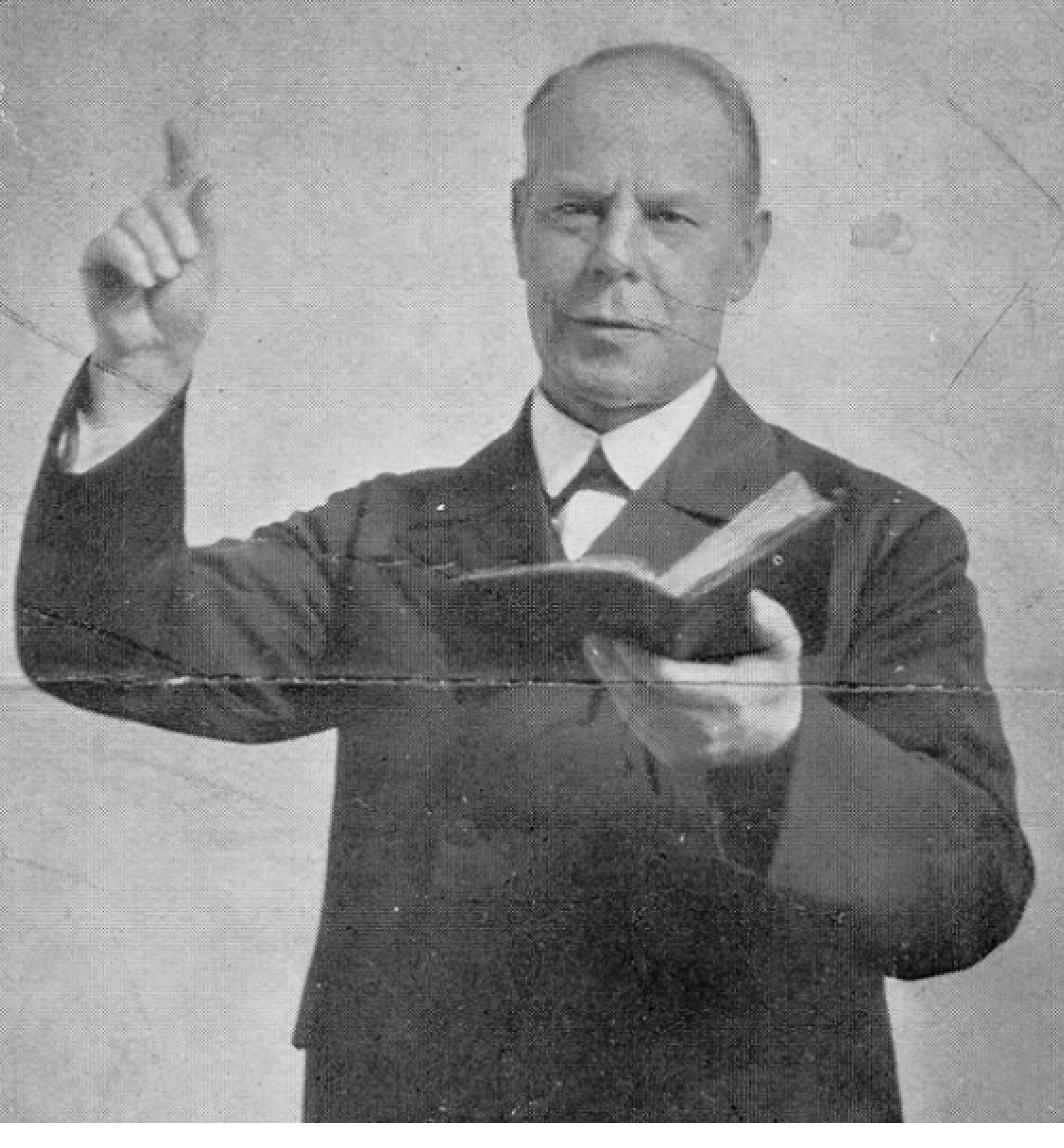 Smith Wigglesworth, the Apostle of Faith, holding his Bible